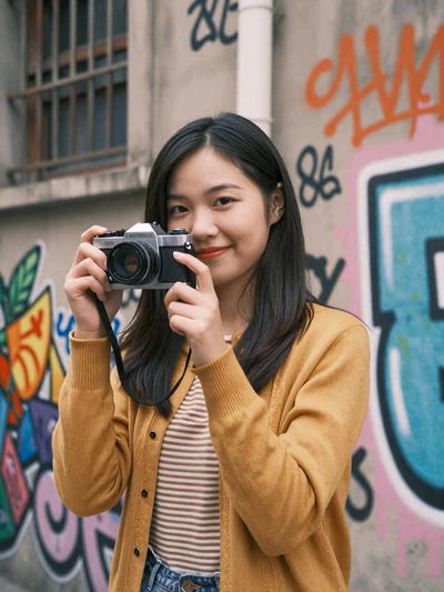 Ling, 25, verified Chinese woman with vintage camera in Guangzhou art district - safe online dating